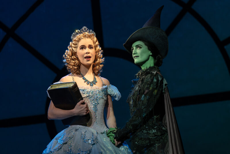 Austen Danielle Bohmer as Glinda and Lauren Samuels as Elphaba in the National Tour of WICKED, photo by Joan Marcus 2024